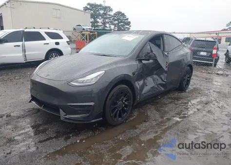 2021 Tesla Model Y Standard Range Rear-Wheel Drive from USA, damaged, VIN 5YJYGDED2MF174984